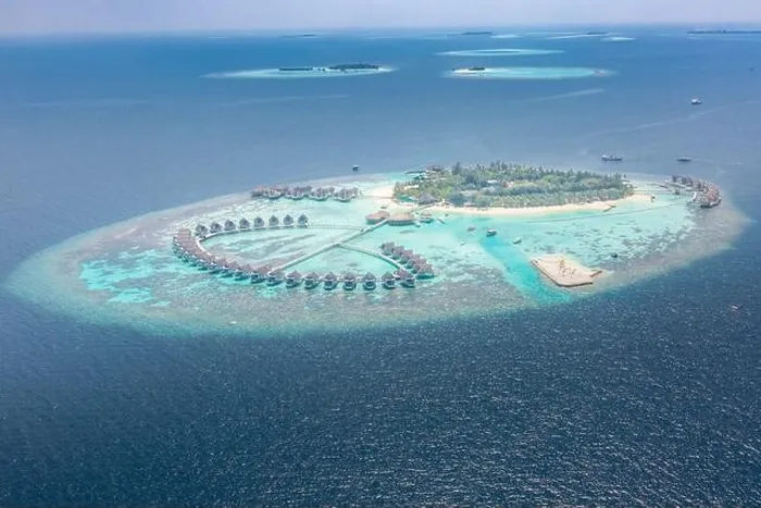 Framed Print : Perfect aerial landscape, luxury tropical resort or hotel with water villas and beautiful beach scenery. Amazing bird eyes view in Maldives, landscape Framed Print : Perfect aerial landscape, luxury tropical resort or hotel with water villas and beautiful beach scenery. Amazing bird eyes view in Maldives, landscape