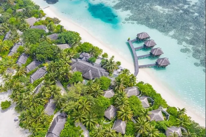 Framed Print : Perfect aerial landscape, luxury tropical resort or hotel with water villas and beautiful beach scenery. Amazing bird eyes view in Maldives, landscape