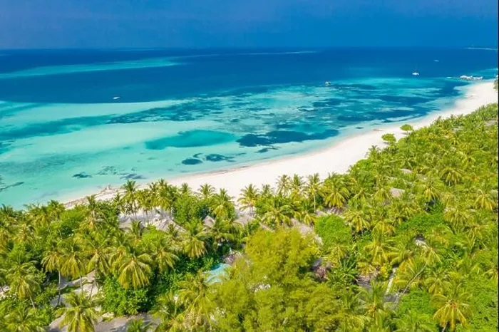Framed Print : Perfect aerial landscape, luxury tropical resort or hotel with water villas and beautiful beach scenery. Amazing bird eyes view in Maldives, landscape