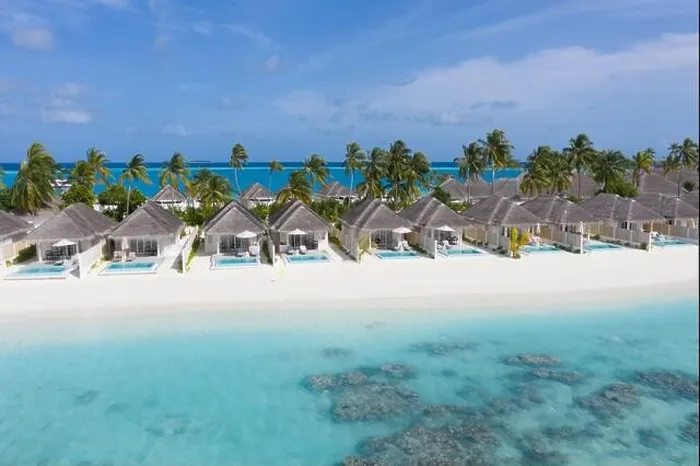 Framed Print : Perfect aerial landscape, luxury tropical resort or hotel with water villas and beautiful beach scenery. Amazing bird eyes view in Maldives, landscape Framed Print : Perfect aerial landscape, luxury tropical resort or hotel with water villas and beautiful beach scenery. Amazing bird eyes view in Maldives, landscape