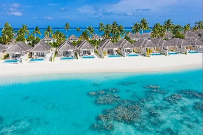 Framed Print : Perfect aerial landscape, luxury tropical resort or hotel with water villas and beautiful beach scenery. Amazing bird eyes view in Maldives, landscape Framed Print : Perfect aerial landscape, luxury tropical resort or hotel with water villas and beautiful beach scenery. Amazing bird eyes view in Maldives, landscape