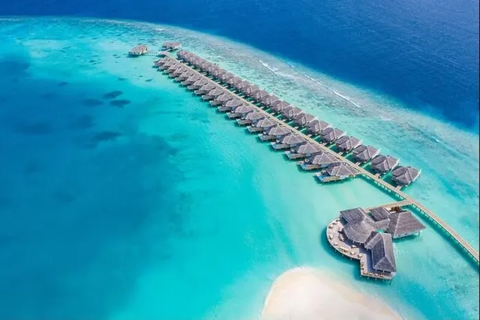 Framed Print : Perfect aerial landscape, luxury tropical resort or hotel with water villas and beautiful beach scenery. Amazing bird eyes view in Maldives, landscape Framed Print : Perfect aerial landscape, luxury tropical resort or hotel with water villas and beautiful beach scenery. Amazing bird eyes view in Maldives, landscape
