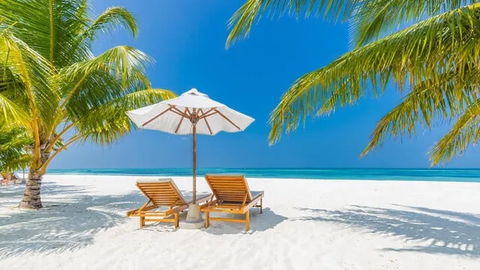 Framed Print : Perfect beach panorama, palms two sun beds and umbrella near the sea, idyllic beach scene. Tropical vacation and beach resort holiday banner concept Framed Print : Perfect beach panorama, palms two sun beds and umbrella near the sea, idyllic beach scene. Tropical vacation and beach resort holiday banner concept