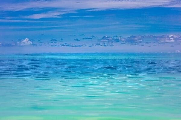 Perfect sky and water of Indian ocean. Tropical seascape, blue sky, dream nature environment. Peaceful, tranquil blue sea