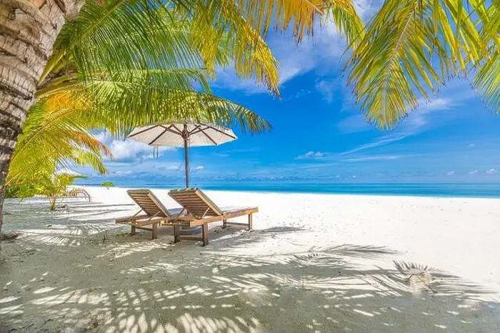 Framed Print : Perfect sunny beach. Idyllic tropical beach landscape for background. Couple honeymoon, romantic destination, freedom lounge chairs umbrella palm sand