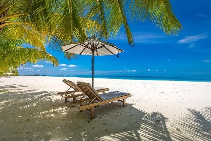 Framed Print : Perfect sunny beach. Idyllic tropical beach landscape for background. Couple honeymoon, romantic destination, freedom lounge chairs umbrella palm sand