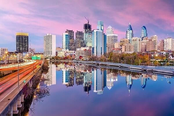 Philadelphia, Pennsylvania, USA downtown skyline on the river in autumn