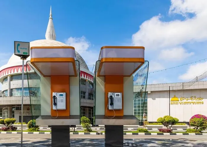 Framed Print : Phone booths of TELBRU (Telekom Brunei) in front of the Royal Regalia Museum (malay) Framed Print : Phone booths of TELBRU (Telekom Brunei) in front of the Royal Regalia Museum (malay)
