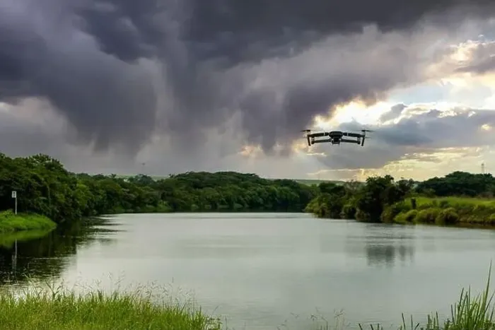Framed Print : photo of a drone flying over the tiete river in a cloudy morning Framed Print : photo of a drone flying over the tiete river in a cloudy morning