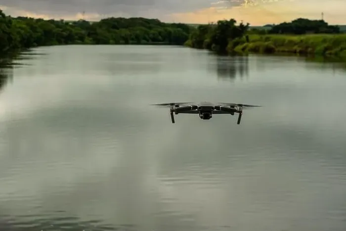 Framed Print : photo of a drone flying over the tiete river in a cloudy morning Framed Print : photo of a drone flying over the tiete river in a cloudy morning