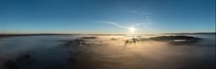 Framed Print : Photo from a drone over the village when fog fell with thick clouds Framed Print : Photo from a drone over the village when fog fell with thick clouds