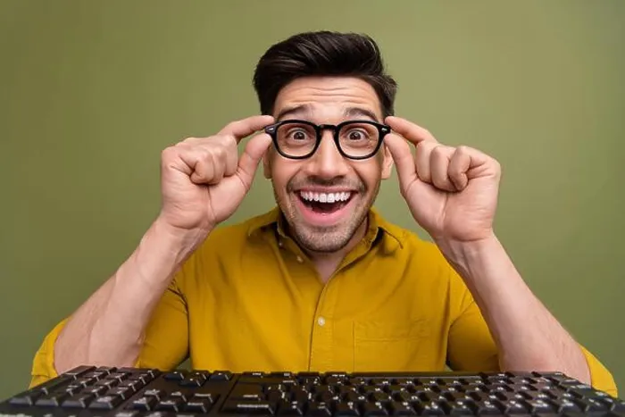 Framed Print : Photo of excited cheerful positive man wear yellow stylish clothes hold eyeglasses looking camera isolated on khaki Framed Print : Photo of excited cheerful positive man wear yellow stylish clothes hold eyeglasses looking camera isolated on khaki