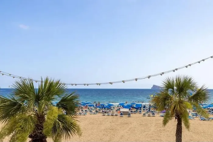 Framed Print : Photo of the famous Levante Beach in Benidorm Spain showing people having fun on the Spanish beach on a hot sunny day Framed Print : Photo of the famous Levante Beach in Benidorm Spain showing people having fun on the Spanish beach on a hot sunny day