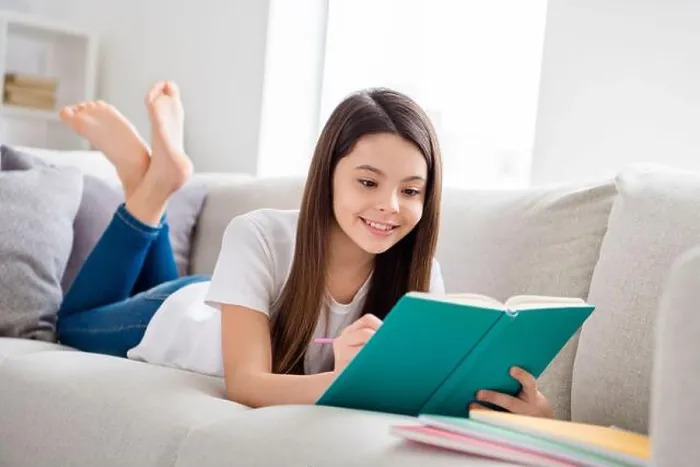 Framed Print : Photo of little pretty pupil school lady lying comfy sofa reading diary book positive good mood diligent student write Framed Print : Photo of little pretty pupil school lady lying comfy sofa reading diary book positive good mood diligent student write