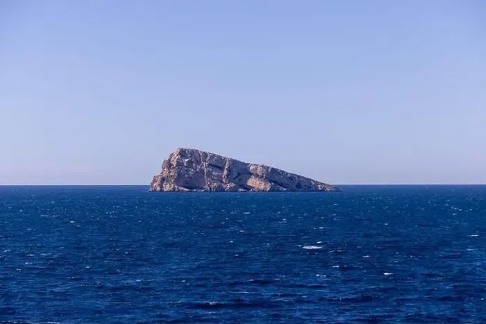 Framed Print : Photo of the town of Benidorm in Spain showing the rock in the middle of the ocean known as Isla de Benidorm or Mirador Framed Print : Photo of the town of Benidorm in Spain showing the rock in the middle of the ocean known as Isla de Benidorm or Mirador