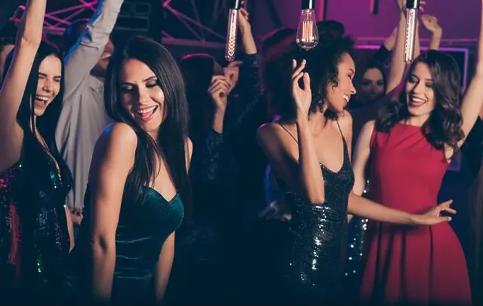 Framed Print : Photo of young beautiful girls dancing on party in night club wearing classy stylish dresses smiling relaxing together Framed Print : Photo of young beautiful girls dancing on party in night club wearing classy stylish dresses smiling relaxing together