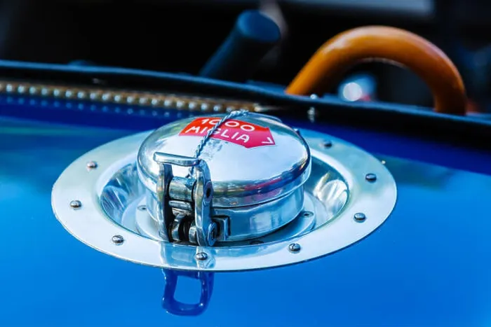 Framed Print : picture of a fuel filler port of a historical car with a mille miglia label, a legendary car race Framed Print : picture of a fuel filler port of a historical car with a mille miglia label, a legendary car race