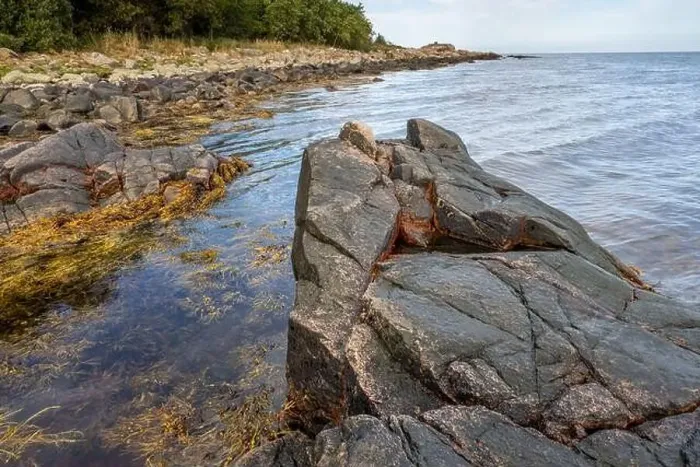 Framed Print : A picture of a rock against the blue water. Picture from Skalderviken, southern Sweden Framed Print : A picture of a rock against the blue water. Picture from Skalderviken, southern Sweden