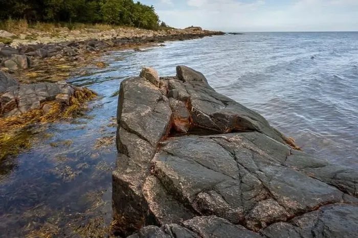 Framed Print : A picture of a rock against the blue water. Picture from Skalderviken, southern Sweden Framed Print : A picture of a rock against the blue water. Picture from Skalderviken, southern Sweden