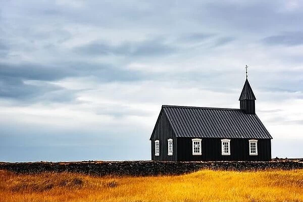 Picturesque autumn landscape with famous picturesque black church of Budir at Snaefellsnes peninsula region in Iceland