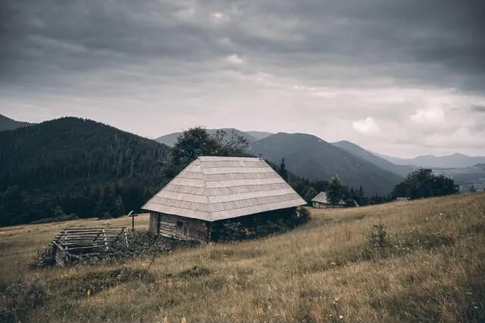Framed Print : Picturesque autumn meadow with old wooden house and cloudy sky in the Carpathian mountains, Ukraine. Landscape photography Framed Print : Picturesque autumn meadow with old wooden house and cloudy sky in the Carpathian mountains, Ukraine. Landscape photography