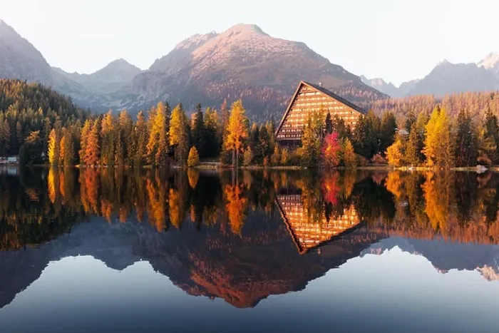 Framed Print : Picturesque autumn view of lake Strbske pleso in High Tatras National Park, Slovakia. Clear water with reflections of orange larch and high mountains Framed Print : Picturesque autumn view of lake Strbske pleso in High Tatras National Park, Slovakia. Clear water with reflections of orange larch and high mountains