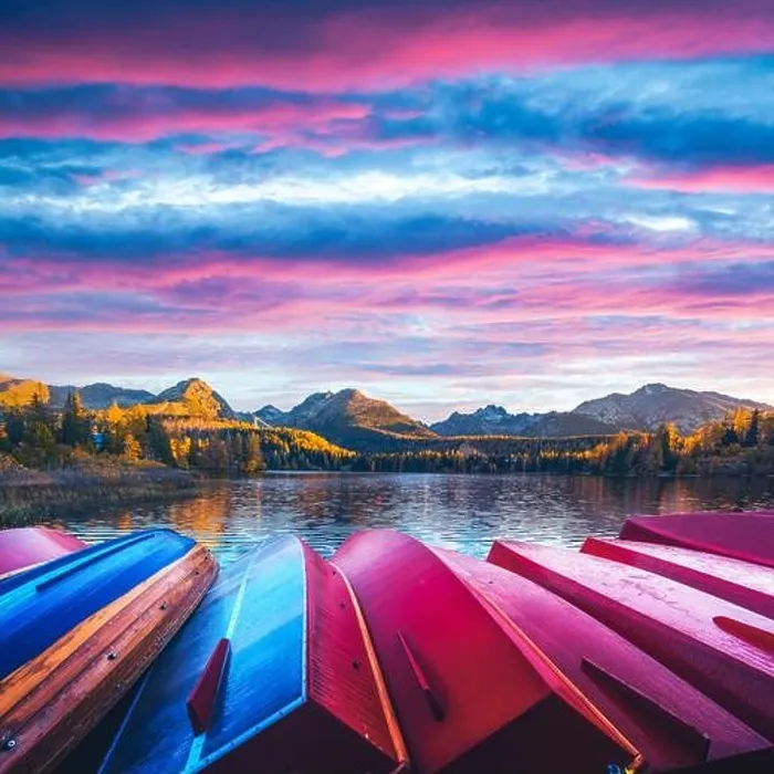 Framed Print : Picturesque autumn view of lake Strbske pleso in High Tatras National Park, Slovakia. Row of red wooden boats and high mountains on background Framed Print : Picturesque autumn view of lake Strbske pleso in High Tatras National Park, Slovakia. Row of red wooden boats and high mountains on background