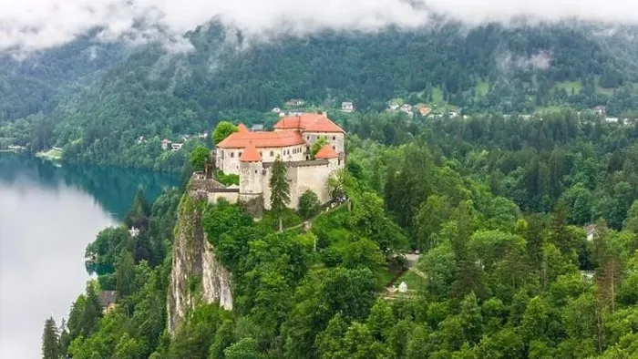Framed Print : Picturesque Bled Castle and Lake Bled Captured by Drone Framed Print : Picturesque Bled Castle and Lake Bled Captured by Drone