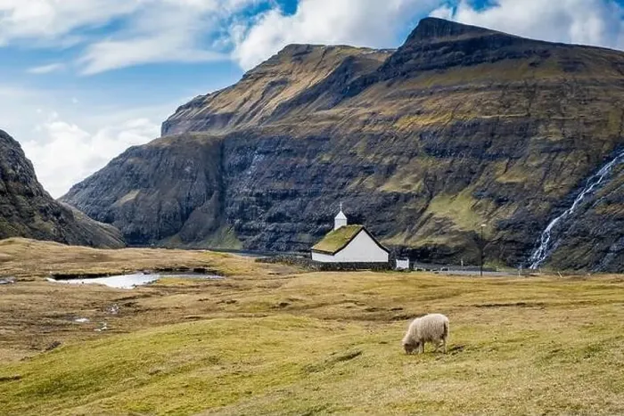 Framed Print : A picturesque church with a sheep, in Saksun, Faroe Islands Framed Print : A picturesque church with a sheep, in Saksun, Faroe Islands