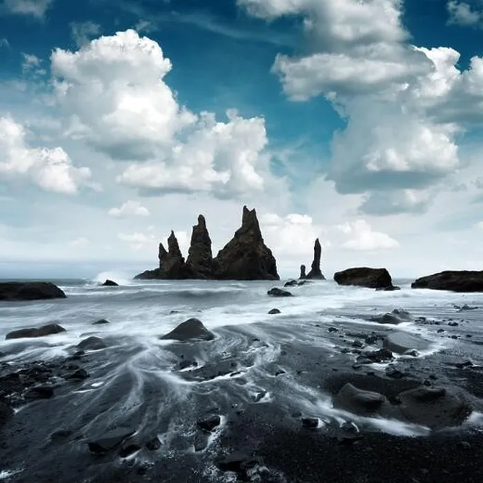 Framed Print : Picturesque landscape with basalt rock formations Troll Toes on Black beach, stormy ocean waves and cloudscape. Reynisdrangar, Vik, Iceland Framed Print : Picturesque landscape with basalt rock formations Troll Toes on Black beach, stormy ocean waves and cloudscape. Reynisdrangar, Vik, Iceland