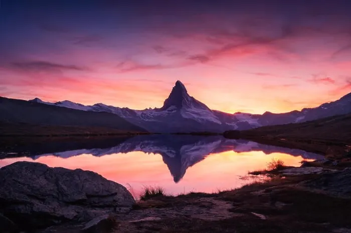 Framed Print : Picturesque landscape with colorful sunrise on Stellisee lake. Snowy Matterhorn Cervino peak with reflection in clear water. Zermatt, Swiss Alps Framed Print : Picturesque landscape with colorful sunrise on Stellisee lake. Snowy Matterhorn Cervino peak with reflection in clear water. Zermatt, Swiss Alps