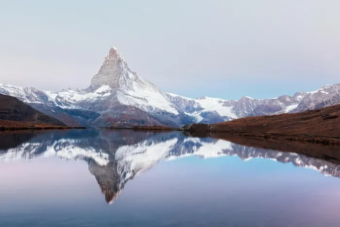 Framed Print : Picturesque landscape with colorful sunrise on Stellisee lake. Snowy Matterhorn Cervino peak with reflection in clear water. Zermatt, Swiss Alps Framed Print : Picturesque landscape with colorful sunrise on Stellisee lake. Snowy Matterhorn Cervino peak with reflection in clear water. Zermatt, Swiss Alps
