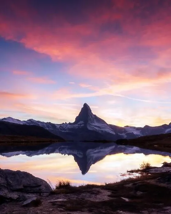 Framed Print : Picturesque landscape with colorful sunrise on Stellisee lake. Snowy Matterhorn Cervino peak with reflection in clear water. Zermatt, Swiss Alps Framed Print : Picturesque landscape with colorful sunrise on Stellisee lake. Snowy Matterhorn Cervino peak with reflection in clear water. Zermatt, Swiss Alps