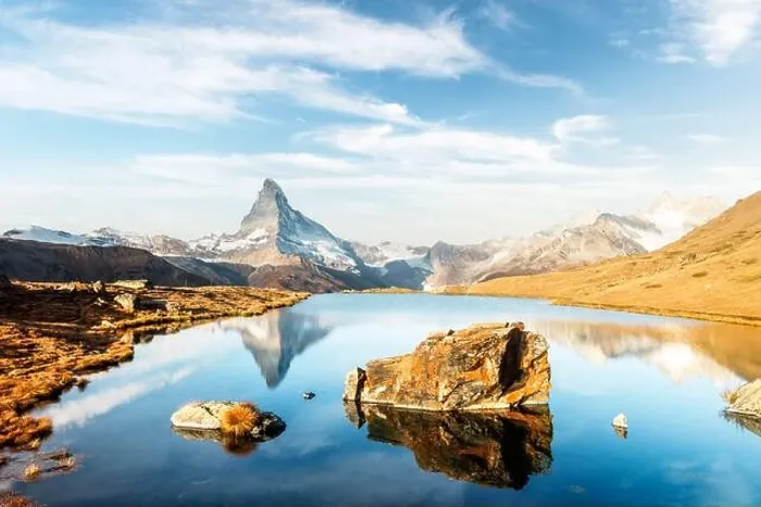 Framed Print : Picturesque landscape with colorful sunrise on Stellisee lake. Snowy Matterhorn Cervino peak with reflection in clear water. Zermatt, Swiss Alps Framed Print : Picturesque landscape with colorful sunrise on Stellisee lake. Snowy Matterhorn Cervino peak with reflection in clear water. Zermatt, Swiss Alps