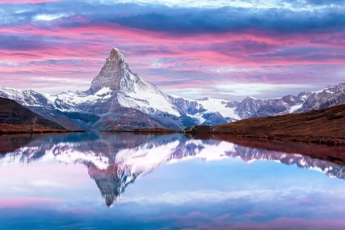Framed Print : Picturesque landscape with colorful sunrise on Stellisee lake. Snowy Matterhorn Cervino peak with reflection in clear water. Zermatt, Swiss Alps Framed Print : Picturesque landscape with colorful sunrise on Stellisee lake. Snowy Matterhorn Cervino peak with reflection in clear water. Zermatt, Swiss Alps