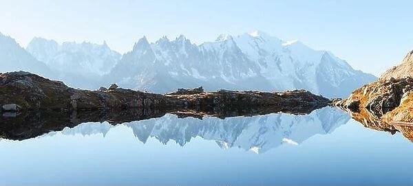 Picturesque panorama of Chesery lake (Lac De Cheserys) and snowy Monte Bianco mountains range on background, Chamonix, France Alps