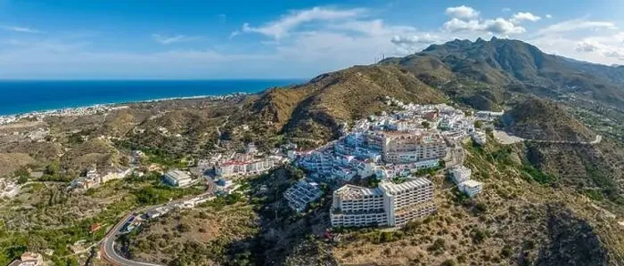 Framed Print : Picturesque spanish hillside white washed village of Mojacar during sunny day against blue sky Framed Print : Picturesque spanish hillside white washed village of Mojacar during sunny day against blue sky