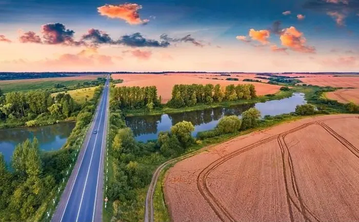 Framed Print : Picturesque summer sunrise on Ternopil outskirts with two lakes and asphalt road on the midle Framed Print : Picturesque summer sunrise on Ternopil outskirts with two lakes and asphalt road on the midle