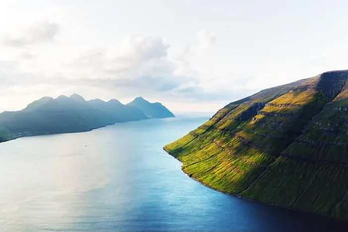 Framed Print : Picturesque sunset view from Klakkur peak near Klaksvik city on Kalsoy island, Faroe Islands, Denmark. Landscape photography Framed Print : Picturesque sunset view from Klakkur peak near Klaksvik city on Kalsoy island, Faroe Islands, Denmark. Landscape photography