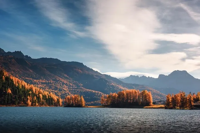 Framed Print : Picturesque view on autumn lake Silvaplana in Swiss Alps. Colorful forest with orange larch and snowy mountains on background. Switzerland Framed Print : Picturesque view on autumn lake Silvaplana in Swiss Alps. Colorful forest with orange larch and snowy mountains on background. Switzerland