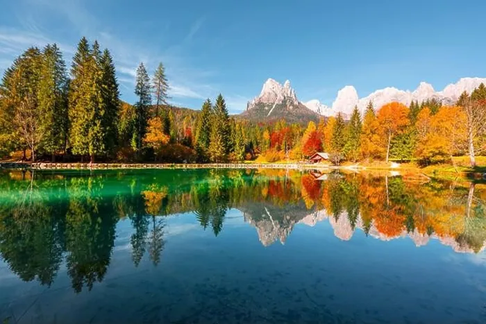 Framed Print : Picturesque view at autumn Welsperg lake in Dolomite Alps. Canali Valley, Primiero San Martino di Castrozza, Province of Trento, Italy Framed Print : Picturesque view at autumn Welsperg lake in Dolomite Alps. Canali Valley, Primiero San Martino di Castrozza, Province of Trento, Italy