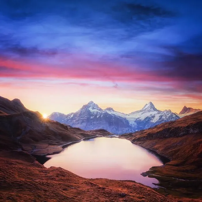 Framed Print : Picturesque view on Bachalpsee lake in Swiss Alps mountains. Snowy peaks of Wetterhorn, Mittelhorn and Rosenhorn on background. Grindelwald valley, Sw Framed Print : Picturesque view on Bachalpsee lake in Swiss Alps mountains. Snowy peaks of Wetterhorn, Mittelhorn and Rosenhorn on background. Grindelwald valley, Sw