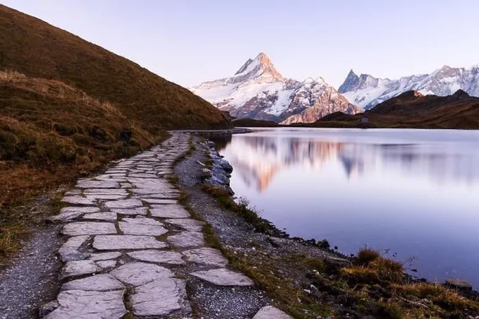 Framed Print : Picturesque view on Bachalpsee lake in Swiss Alps mountains. Snowy peaks of Wetterhorn, Mittelhorn and Rosenhorn on background Framed Print : Picturesque view on Bachalpsee lake in Swiss Alps mountains. Snowy peaks of Wetterhorn, Mittelhorn and Rosenhorn on background