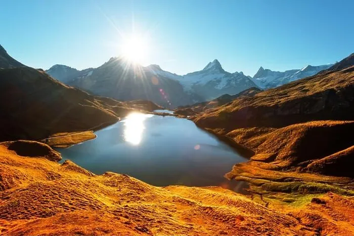 Framed Print : Picturesque view on Bachalpsee lake in Swiss Alps mountains. Snowy peaks of Wetterhorn, Mittelhorn and Rosenhorn on background Framed Print : Picturesque view on Bachalpsee lake in Swiss Alps mountains. Snowy peaks of Wetterhorn, Mittelhorn and Rosenhorn on background