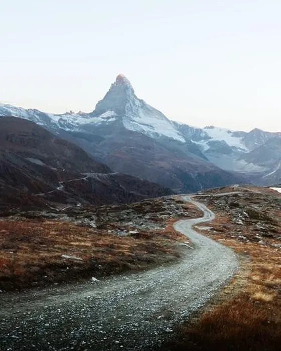 Framed Print : Picturesque view of Matterhorn Cervino peak, dirt road and Stellisee lake in Swiss Alps. Zermatt resort location, Switzerland. Landscape photography Framed Print : Picturesque view of Matterhorn Cervino peak, dirt road and Stellisee lake in Swiss Alps. Zermatt resort location, Switzerland. Landscape photography