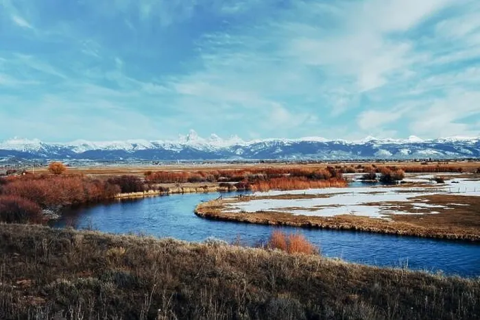 Framed Print : Picturesque view of snow covered Teton mountain range with a winding river in the foreground. Tetonia, Idaho. Teton scenic byway Framed Print : Picturesque view of snow covered Teton mountain range with a winding river in the foreground. Tetonia, Idaho. Teton scenic byway