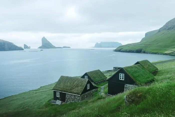 Framed Print : Picturesque view of tradicional faroese grass-covered houses Framed Print : Picturesque view of tradicional faroese grass-covered houses