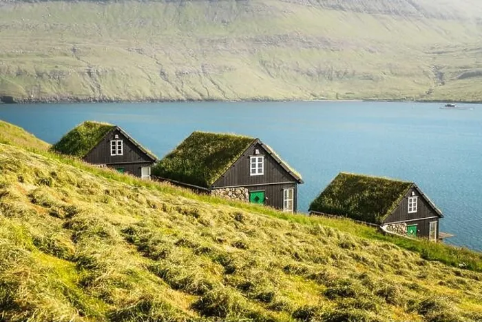 Framed Print : Picturesque view of tradicional faroese grass-covered houses in the village Bour during autumn. Vagar island, Faroe Islands, Denmark Framed Print : Picturesque view of tradicional faroese grass-covered houses in the village Bour during autumn. Vagar island, Faroe Islands, Denmark