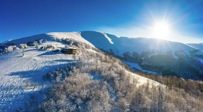 Framed Print : Picturesque winter panorama of mountain hills covered with snow and fir trees on a sunny clear day with the sun Framed Print : Picturesque winter panorama of mountain hills covered with snow and fir trees on a sunny clear day with the sun
