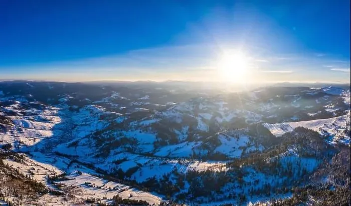 Framed Print : Picturesque winter panorama of mountain hills covered with snow and fir trees on a sunny clear day with the sun Framed Print : Picturesque winter panorama of mountain hills covered with snow and fir trees on a sunny clear day with the sun